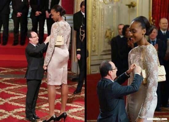الرئيس الفرنسي يكرم احدي لاعبات منتخب فرنسا لكرة السلة !!..يالهوي الرئيس قصير جدا بالنسبالها